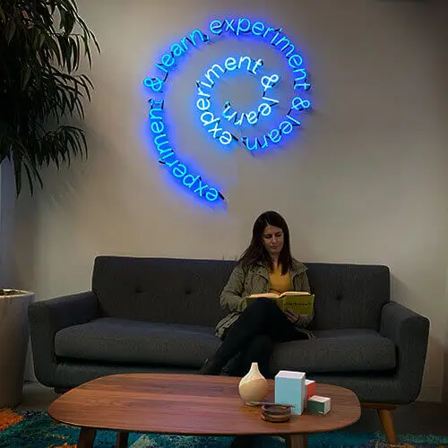 Custom neon office and lobby sign for branding and ambiance